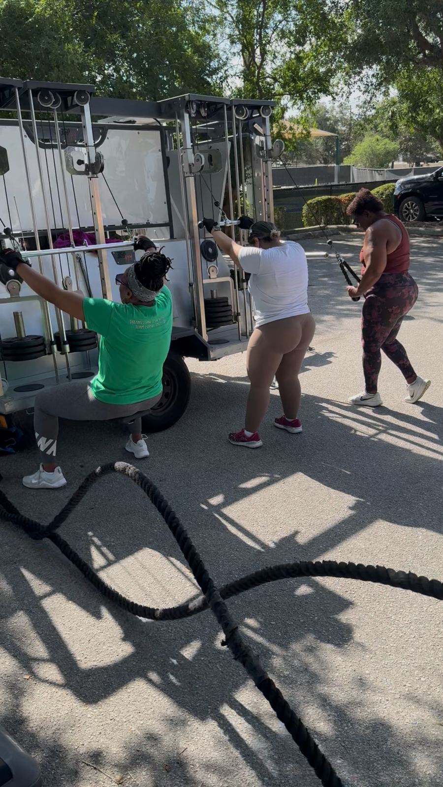 A small group training with cables and battle ropes at the GO GYM! mobile gym